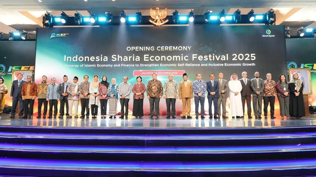 Delegates pose on stage during the opening ceremony of the Indonesia Sharia Economic Festival 2025 in Jakarta
