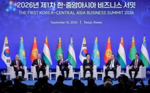 Leaders seated on stage in front of national flags at The First Korea-Central Asia Business Summit 2026 in Seoul