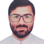 Muhammad Ilyas 1 Man with dark hair, dark-rimmed glasses, and a beard wearing a white shirt