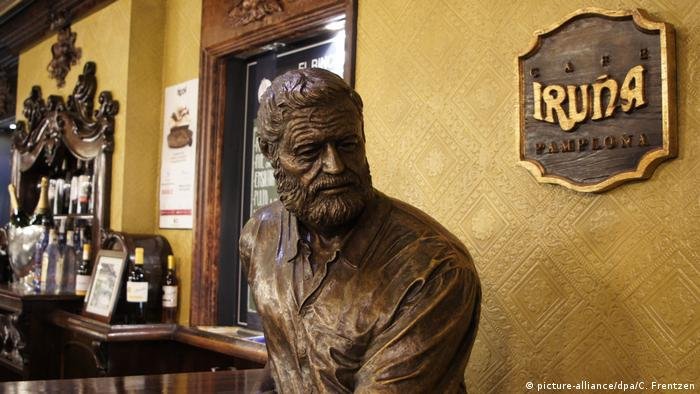 statue of Hemingway in cafe Iruña, one of the most popular in Pamplona