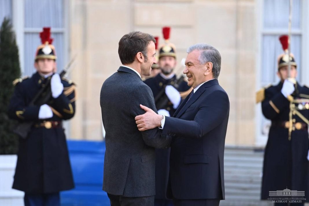 President of the Republic of Uzbekistan Shavkat Mirziyoyev and President of the French Republic Emmanuel Macron meeting.
