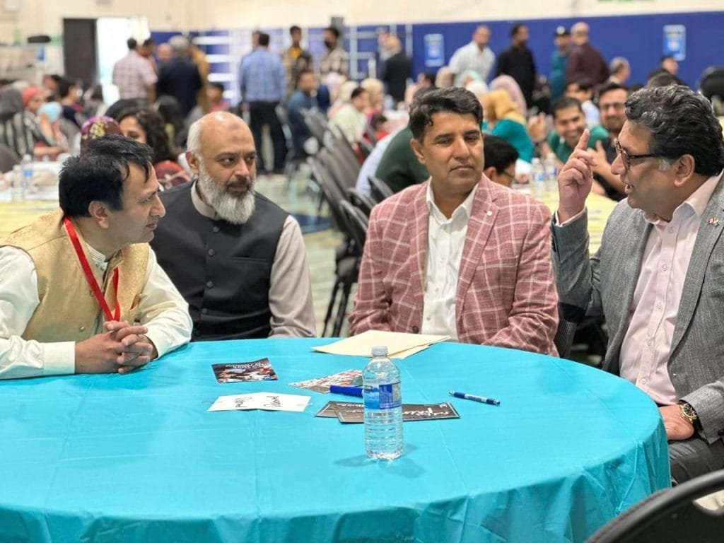 Pakistan's High Commissioner interaction with guests in community gathering
