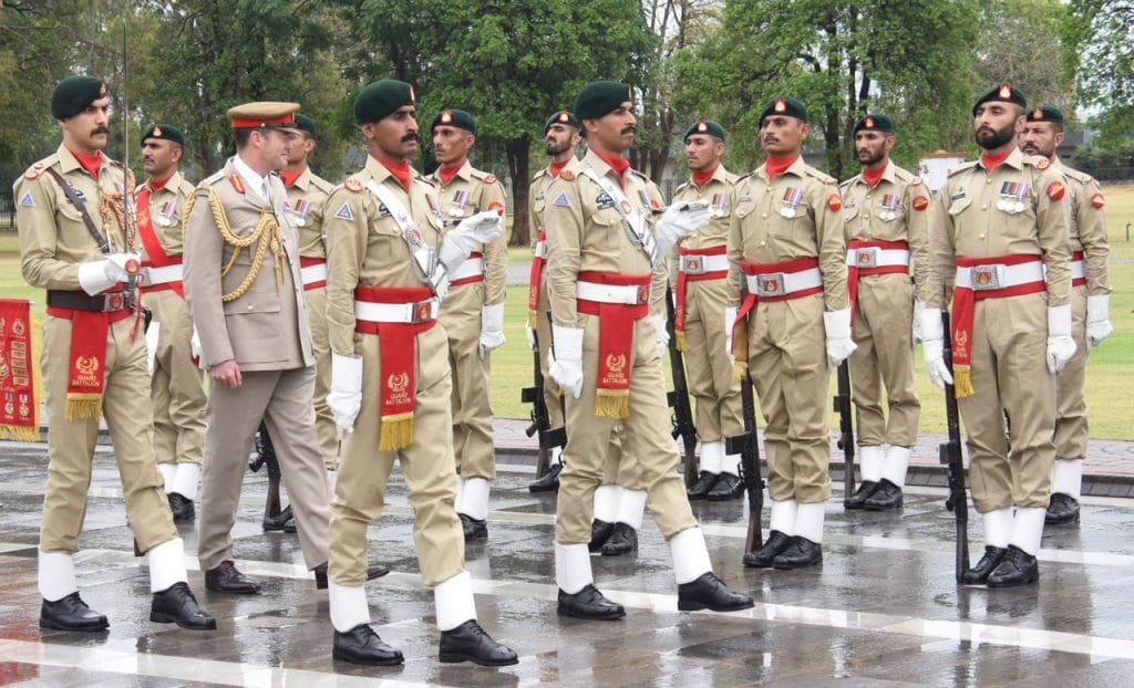 A Pakistan Army personnel is giving the Chief of General Staff of the British Army, General Patrick Sanders a guard of honor.