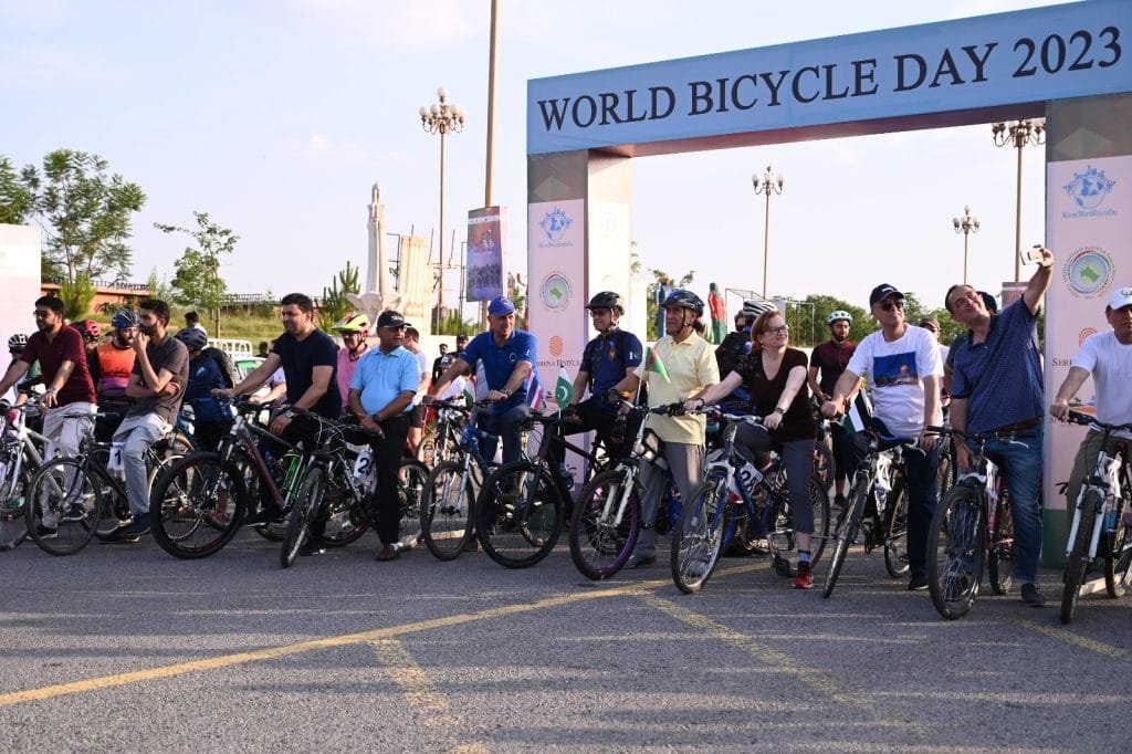 Participants cycling in Islamabad during the World Bicycle Day celebration.