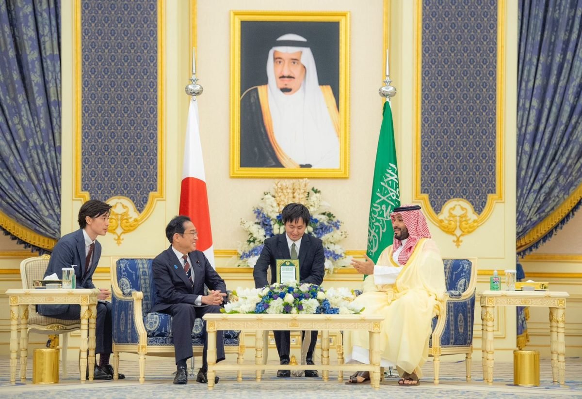 Saudi Crown Prince Mohammad bin Salman (R) meets Japanese Prime Minister Fumio Kishida (L) at Al-Salam Palace in Jeddah on July 16.
