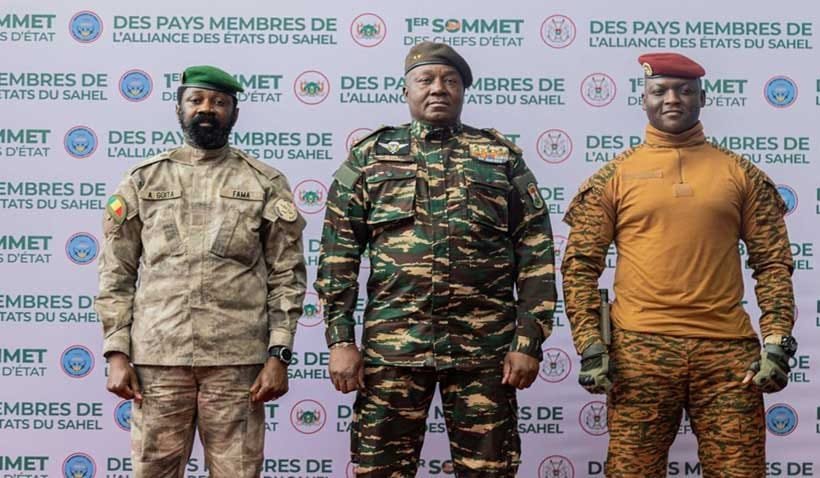 Heads of state of Mali's Assimi Goita, Niger's General Abdourahamane Tiani and Burkina Faso's Captain Ibrahim Traore pose for photographs during the first ordinary summit of heads of state and governments of the Alliance of Sahel States (AES) in Niamey, Niger July 6, 2024.