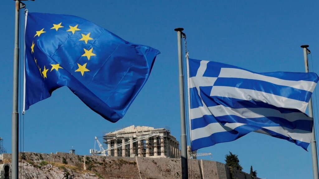 The European Union and Greek flags near the Acropolis in Athens © Petr David Josek/AP