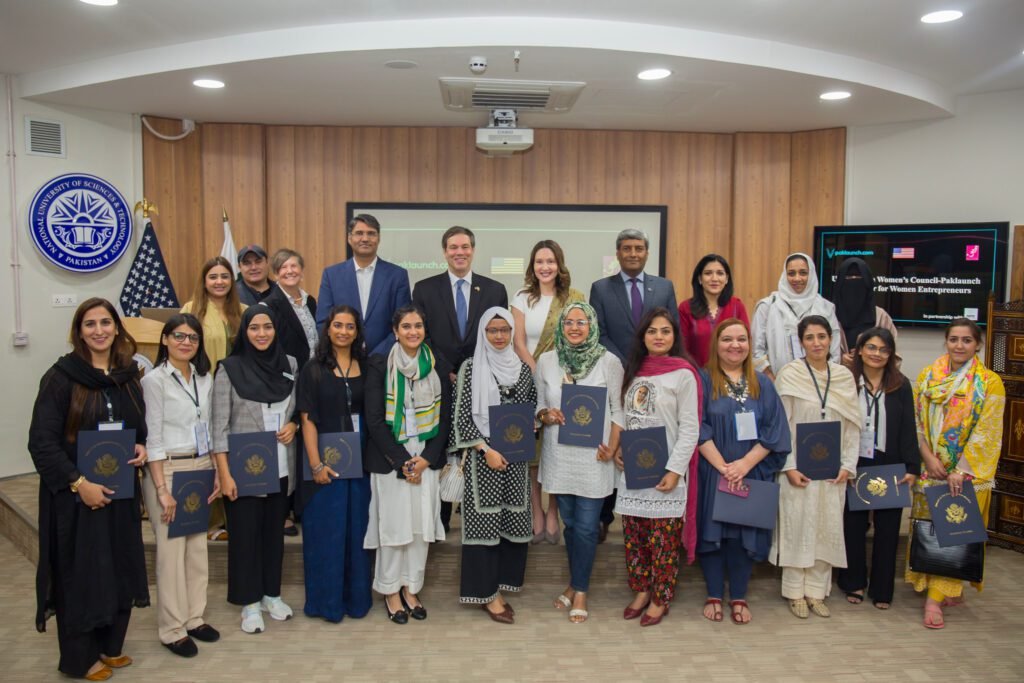 DCM Schofer in a group photo with the finalists and winners of the USPWC Women's Economic Accelerator pitch competition