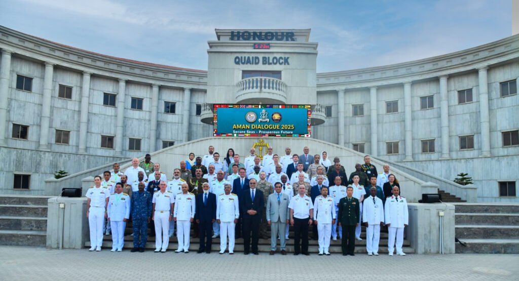 Minister of Planning Development and Special Initiatives Ahsan Iqbal along with Chief of the Naval Staff Admiral Naveed Ashraf in a group photo with foreign dignitaries after closing session of AMAN DIALOUGES 2025