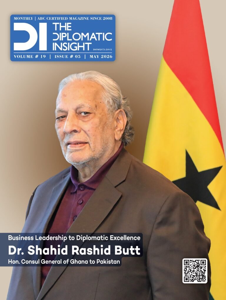 Front cover of "The Diplomatic Insight" magazine, May 2026 edition (Volume 19, Issue 05). The cover features a portrait of Dr. Shahid Rashid Butt, the Honorary Consul General of Ghana to Pakistan, posing in front of the national flag of Ghana. He is wearing a dark brown suit jacket over a purple shirt. A headline at the bottom reads: "Business Leadership to Diplomatic Excellence," followed by his name and official title. A QR code is visible in the bottom right corner.