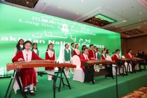 Chinese and Pakistani children perform during the National Day reception at Pakistan Embassy, Beijing